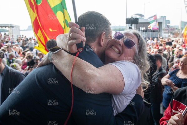 090526 - Picture shows Plaid Cymru leader Rhun Ap Lorwerth greeting supporters outside the Senedd in Cardiff, after winning the Welsh Election