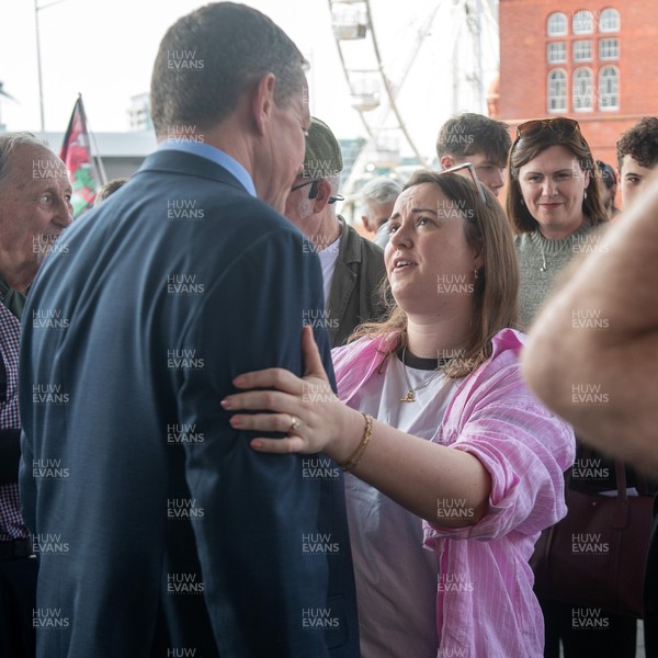 090526 - Picture shows Plaid Cymru leader Rhun Ap Lorwerth greeting supporters outside the Senedd in Cardiff, after winning the Welsh Election