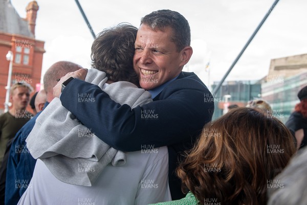090526 - Picture shows Plaid Cymru leader Rhun Ap Lorwerth greeting supporters outside the Senedd in Cardiff, after winning the Welsh Election