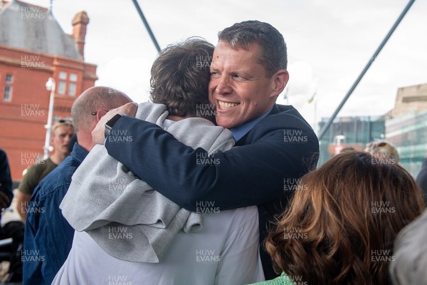 090526 - Picture shows Plaid Cymru leader Rhun Ap Lorwerth greeting supporters outside the Senedd in Cardiff, after winning the Welsh Election