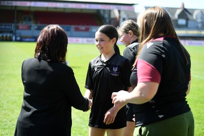 290426 - Plasmawr v Haverfordwest High - Girls Schools Final U12 - Road To Principality Finals - Haverfordwest players collect their medals at full time