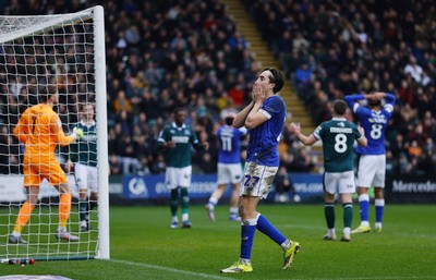 210226 - Plymouth Argyle v Cardiff City - Sky Bet League 1 - Ollie Tanner of Cardiff City has a shot at goal but it goes wide and Joel Colwill of Cardiff City holds his head