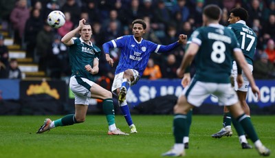 210226 - Plymouth Argyle v Cardiff City - Sky Bet League 1 -  Omari Kellyman of Cardiff City slots the ball into the net for their second goal