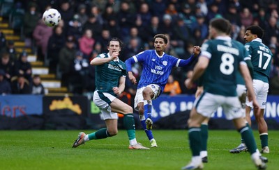 210226 - Plymouth Argyle v Cardiff City - Sky Bet League 1 -  Omari Kellyman of Cardiff City slots the ball into the net for their second goal
