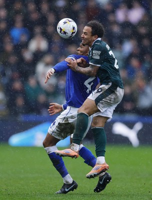 210226 - Plymouth Argyle v Cardiff City - Sky Bet League 1 - Gabriel Osho of Cardiff City holds off Matthew Sorinola of Plymouth Argyle
