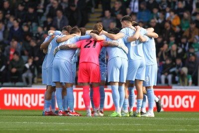 220225 - Plymouth Argyle v Cardiff City - Sky Bet Championship - final preparations for players of Cardiff City who huddle before kick off