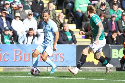 220225 - Plymouth Argyle v Cardiff City - Sky Bet Championship - Andy Rinomhota of Cardiff City takes on Tymoteusz Puchacz of Plymouth Argyle 