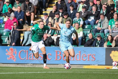 220225 - Plymouth Argyle v Cardiff City - Sky Bet Championship - Rubin Colwill of Cardiff City takes on Maksym Talovierov of Plymouth Argyle