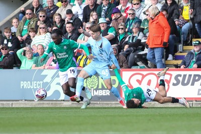 220225 - Plymouth Argyle v Cardiff City - Sky Bet Championship - Cian Ashford of Cardiff City battles with Malachi Boateng (19) and Matthew Sorinol of Plymouth Argyle