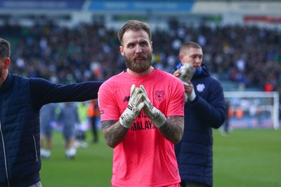 220225 - Plymouth Argyle v Cardiff City - Sky Bet Championship - Jak Alnwick of Cardiff City applauds the travelling fans at the end of the game