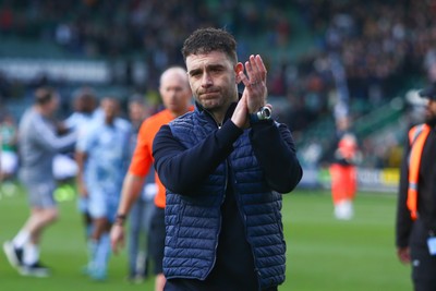 220225 - Plymouth Argyle v Cardiff City - Sky Bet Championship - Manager of Cardiff City Omer Riza applauds the travelling fans at the end of the game