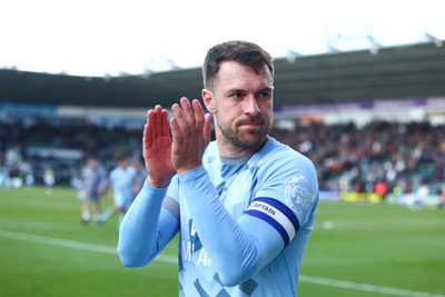 220225 - Plymouth Argyle v Cardiff City - Sky Bet Championship - Aaron Ramsey of Cardiff City applauds the travelling fans at the end of the game