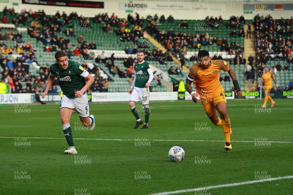 010220 - Plymouth Argyle v Newport County - EFL SkyBet League 2 - Joss Labadie of Newport County and Scott Wooton of Plymouth Argyle chase a through ball
