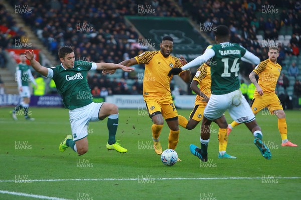 010220 - Plymouth Argyle v Newport County - EFL SkyBet League 2 - Jamille Matt of Newport County takes on Tyreeq Bakinson and Niall Canavan of Plymouth Argyle