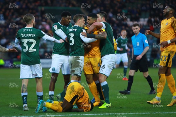 010220 - Plymouth Argyle v Newport County - EFL SkyBet League 2 - Joss Labadie of Newport County clashes with Gary Sawyer of Plymouth Argyle