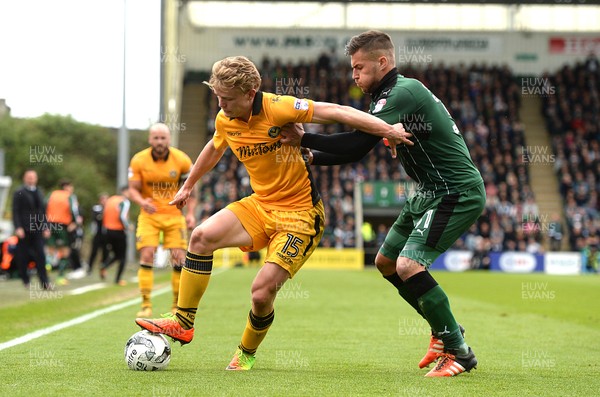 170417 - Plymouth Argyle v Newport County - SkyBet League 2 - Alex Samuel of Newport County is tackled by Jakub Sokolik of Plymouth Argyle