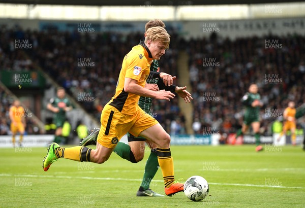 170417 - Plymouth Argyle v Newport County - SkyBet League 2 - Alex Samuel of Newport County is tackled by Gary Sawyer of Plymouth Argyle