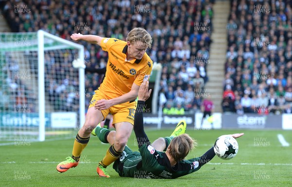 170417 - Plymouth Argyle v Newport County - SkyBet League 2 - Alex Samuel of Newport County is tackled by Matthew Kennedy of Plymouth Argyle