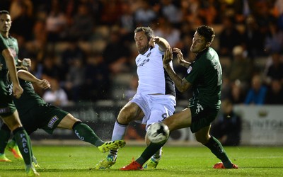 300816 - Plymouth Argyle v Newport County - Checkatrade Trophy -Jon Parkin of Newport County looks for a way past Sonny Bradley of Plymouth Argyle