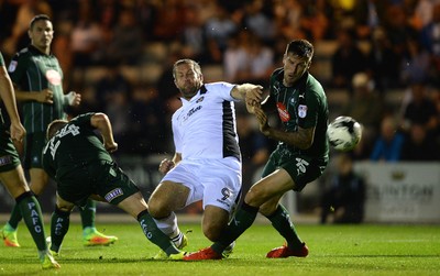 300816 - Plymouth Argyle v Newport County - Checkatrade Trophy -Jon Parkin of Newport County looks for a way past Sonny Bradley of Plymouth Argyle