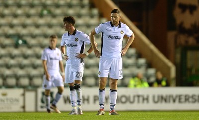 300816 - Plymouth Argyle v Newport County - Checkatrade Trophy -Ben Tozer of Newport County looks dejected