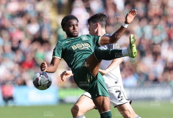 071023 - Plymouth Argyle v Swansea City, EFL Sky Bet Championship -Bali Mumba of Plymouth Argyle and Josh Key of Swansea City compete for the ball
