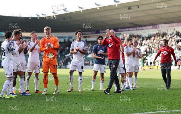 071023 - Plymouth Argyle v Swansea City, EFL Sky Bet Championship - Swansea City head coach Michael Duff and players applaud the fans at the end of the match