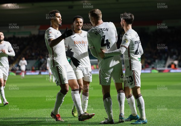 101224 Plymouth Argyle v Swansea City, EFL Sky Bet Championship - Jay Fulton of Swansea City celebrates with team mates after scoring the opening goal