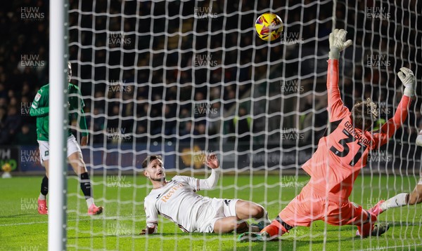 101224 Plymouth Argyle v Swansea City, EFL Sky Bet Championship - Liam Cullen of Swansea City beats Plymouth goalkeeper Daniel Grimshaw to score the second goal