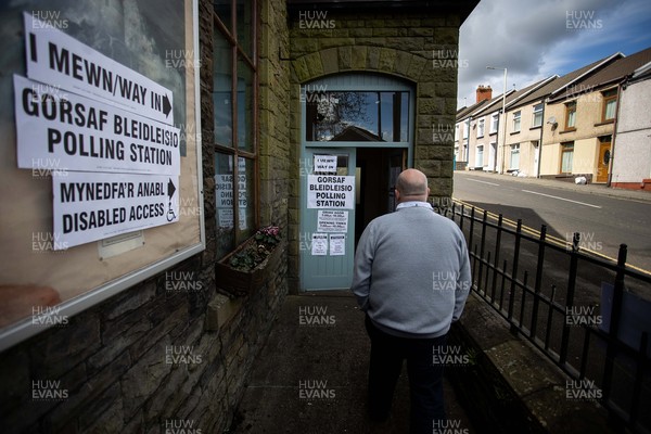 060521 - Picture shows a man walking into the Polling Station at The Temple Baptist Church in Graig, Pontypridd, South Wales on election day