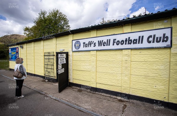060521 - Picture shows a voter waiting outside the Polling Station which is inside the home changing rooms at Taff�s Well Football Club in South Wales on election day
