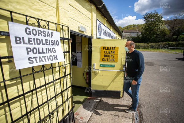 060521 - Picture shows a man walking into the Polling Station which is inside the home changing rooms at Taff�s Well Football Club in South Wales on election day