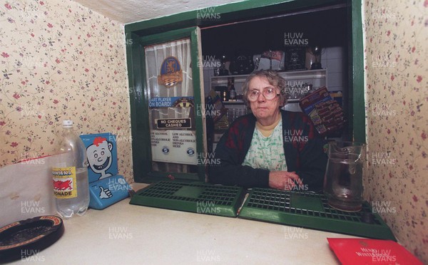 060199 Pontfaen feature - Bessie Davies at the bar inside The Dyffryn Arms pub in Pontfaen