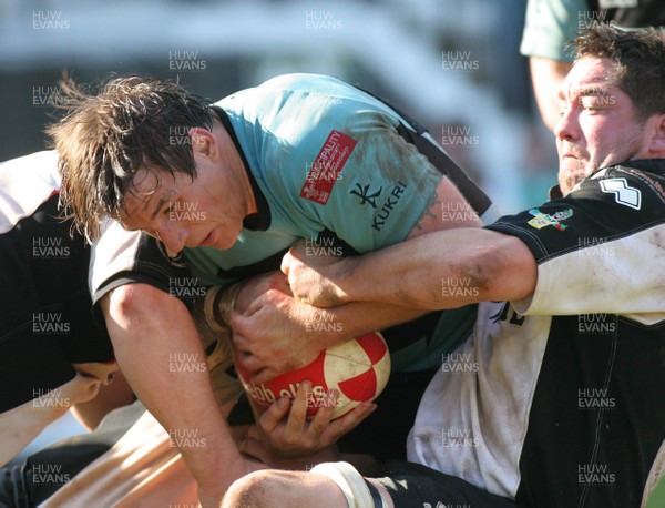 27.09.08 Pontypridd RFC vs. Cardiff RFC. Principality Premiership, Cardiff. Kieran Crawford is held up by Sam Hobbs(L) & Nathan Strong. 