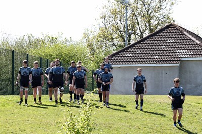 250426 - Pontyberem v Llanybydder - Admiral National League 4 West A - Pontyberem players walk to the pitch