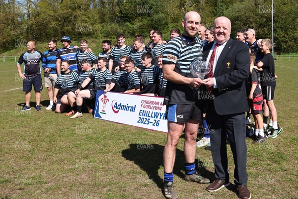 250426 - Pontyberem v Llanybydder - Admiral National League 4 West A - Pontyberem captain Tom Lloyd receives the trophy from WRU Rep Kevin Lewis 