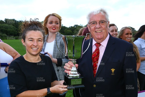 290723 - Pontyclun Falcons - Admiral Women's Premiership Winners - Captain of Pontyclun Falcons receives the league trophy from Gwyn Bowden of WRU  