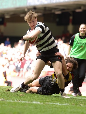 190426 - Pontyclun v Llangadog, Mens Division 4 Cup Final - Harri Stiff of Pontyclun is tackled by Iestyn Williams of Llangadog
