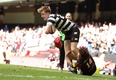 190426 - Pontyclun v Llangadog, Mens Division 4 Cup Final - Harri Stiff of Pontyclun is tackled by Iestyn Williams of Llangadog