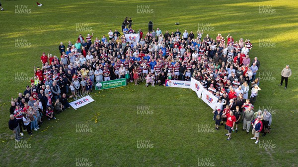 250523 - Pontypool RFC celebrate at Pontypool Park with their fans after being presented with the Admiral Championship League trophy by WRU board member Bryn Parker