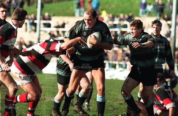 210295 - Pontypool v Cardiff - Derwyn Jones of Cardiff is tackled by Dafydd Evans of Pontypool