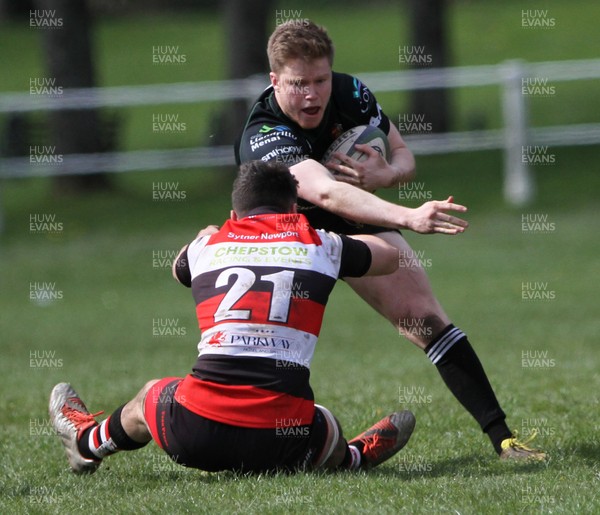 230416 - Pontypool RFC v RGC1404 - SWALEC Championship - Danny Cross of RGC is tackled by Nathan Hudd of Pontypool