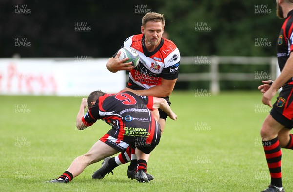 020917 - Pontypool RFC v Rhydyfelin RFC - SSE WRU National Championship - Dan Robinson of Pontypool is tackled by Macauley Griffiths of Rhydyfelin  