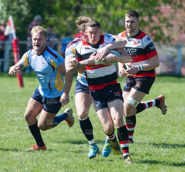 080417 - Pontypool v Tata Steel - Pontypool's Tom Hancock is tackled