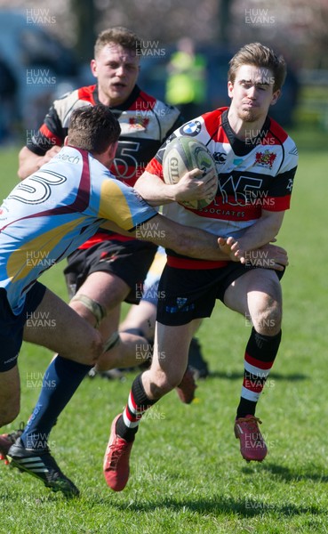 080417 - Pontypool v Tata Steel - Pontypool's Tom Hancock is tackled by Liam Popham