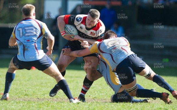 080417 - Pontypool v Tata Steel - Pontypool's Jordan Williams is tackled by Ryan Davies