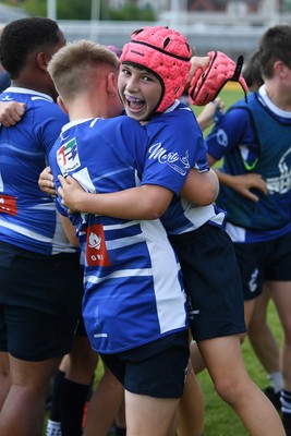 210525 - Pontypridd Schools v Bridgend - WSRU Junior Group - U11’s DC Thomas Cup Final - Bridgend players celebrate the win at full time