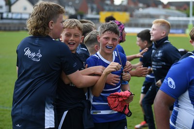 210525 - Pontypridd Schools v Bridgend - WSRU Junior Group - U11’s DC Thomas Cup Final - Bridgend players celebrate the win at full time