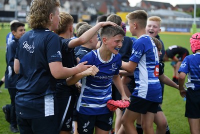 210525 - Pontypridd Schools v Bridgend - WSRU Junior Group - U11’s DC Thomas Cup Final - Bridgend players celebrate the win at full time