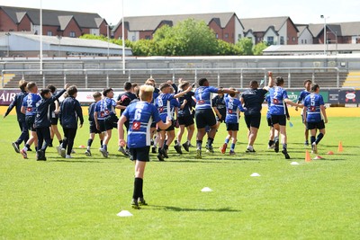 210525 - Pontypridd Schools v Bridgend - WSRU Junior Group - U11’s DC Thomas Cup Final - Bridgend players celebrate the win at full time